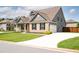 Charming home with brick accents, a well-manicured lawn, and an attached two-car garage at 1809 Hanwoo Ln, Powder Springs, GA 30127