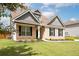 Well-maintained brick home features a pristine lawn and inviting front entrance at 1809 Hanwoo Ln, Powder Springs, GA 30127