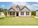 Charming brick home with a well-manicured lawn and inviting curb appeal at 1809 Hanwoo Ln, Powder Springs, GA 30127