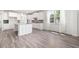 Modern kitchen with stainless steel appliances, white cabinetry, and island at 1809 Hanwoo Ln, Powder Springs, GA 30127