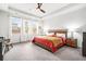 Bright main bedroom features tray ceiling and ample natural light at 1809 Hanwoo Ln, Powder Springs, GA 30127