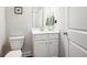 Modern powder room with white vanity and stylish sink at 1809 Hanwoo Ln, Powder Springs, GA 30127