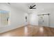 Bedroom with hardwood floors, barn door, and large windows at 4253 Biltmore Pl, Marietta, GA 30062