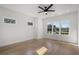 Bedroom featuring hardwood floors, ceiling fan, and big windows at 4253 Biltmore Pl, Marietta, GA 30062