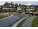 Gated community entrance showcasing elegant homes and meticulously maintained landscaping for premier living at 4253 Biltmore Pl, Marietta, GA 30062