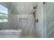 Marble shower featuring a built-in seat and niche, offering a spa-like experience at 4253 Biltmore Pl, Marietta, GA 30062