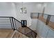 Open staircase with hardwood stairs and modern metal railing at 4253 Biltmore Pl, Marietta, GA 30062