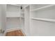 Walk-in closet with shelves and hanging rods at 4253 Biltmore Pl, Marietta, GA 30062