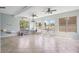 Large bonus room with multiple windows, tile flooring, and plenty of natural light at 5805 Fielding Ct, Cumming, GA 30041