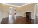 Dining room featuring hardwood floors, chair rail, crown molding and arched entryways at 5805 Fielding Ct, Cumming, GA 30041