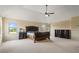 Comfortable main bedroom with carpet, windows, a ceiling fan, and classic furnishings at 5805 Fielding Ct, Cumming, GA 30041
