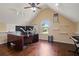 Office with hardwood floors, track lighting, fan, white board, desk, and window view at 5805 Fielding Ct, Cumming, GA 30041
