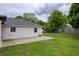 Well-kept backyard with a patio area, offering outdoor relaxation and entertainment space at 7925 Silversmith Dr, Cumming, GA 30028