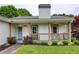 Inviting front porch with decorative accents and a cozy seating area at 7925 Silversmith Dr, Cumming, GA 30028