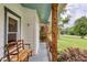 Inviting front porch with decorative accents and a cozy seating area at 7925 Silversmith Dr, Cumming, GA 30028