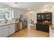 Modern kitchen featuring stainless steel appliances, butcher block countertops, and stylish cabinetry at 7925 Silversmith Dr, Cumming, GA 30028