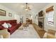Bright and inviting living room with a cozy fireplace and comfortable furniture at 7925 Silversmith Dr, Cumming, GA 30028