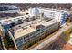 This aerial showcases the building's expansive layout and proximity to surrounding landscape at 890 Memorial Se Dr # 105, Atlanta, GA 30316