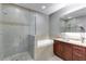 Modern bathroom featuring glass shower, soaking tub and vanity with granite countertop at 890 Memorial Se Dr # 105, Atlanta, GA 30316