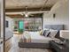 Bedroom featuring industrial ceilings, a wall of windows, and stylish contemporary furnishings at 890 Memorial Se Dr # 105, Atlanta, GA 30316