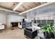 Stylish lounge area with sleek bar, modern furniture, and concrete floors at 890 Memorial Se Dr # 105, Atlanta, GA 30316