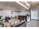 Modern lounge area with a bar, comfortable seating, and stainless steel appliances at 890 Memorial Se Dr # 105, Atlanta, GA 30316
