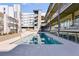 Relaxing pool area in a modern complex with clear blue water and stylish design at 890 Memorial Se Dr # 105, Atlanta, GA 30316