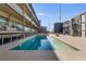Exterior view of building showing a pool and nice building architecture at 890 Memorial Se Dr # 105, Atlanta, GA 30316