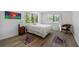 Inviting bedroom with hardwood floors, natural light, and stylish wall art at 907 Parkaire Xing, Marietta, GA 30068