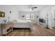 Comfortable bedroom with a ceiling fan, natural light, and wood-look flooring at 907 Parkaire Xing, Marietta, GA 30068