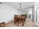 Charming dining area with wood table, matching chairs, and mirrored wall at 907 Parkaire Xing, Marietta, GA 30068