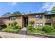 Attractive condo complex featuring well-maintained landscaping and inviting walkways at 907 Parkaire Xing, Marietta, GA 30068