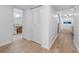 Bright hallway with a view of the bathroom and closet doors at 907 Parkaire Xing, Marietta, GA 30068