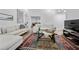 Cozy living room showcasing high ceilings, modern furniture and wood flooring at 907 Parkaire Xing, Marietta, GA 30068