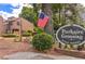 Welcome to Parkaire Crossing: a private residence with inviting benches and mature landscaping at 907 Parkaire Xing, Marietta, GA 30068