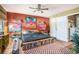 Bedroom with a large bed, colorful decor, and built-in shelving on walls at 100 Biscayne Nw Dr # A1, Atlanta, GA 30309