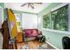 Home office with an easel, colorful decor, and window view at 100 Biscayne Nw Dr # A1, Atlanta, GA 30309