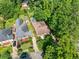 Aerial view of a home with a pool and lush green surroundings at 239 Kings Hwy, Decatur, GA 30030