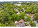 This aerial view captures the neighborhood setting amid lush trees, highlighting the home's location in the community at 239 Kings Hwy, Decatur, GA 30030