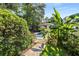 Backyard view of the pool with lush foliage at 239 Kings Hwy, Decatur, GA 30030