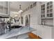 Bright kitchen boasting white cabinets, marble countertops, and stainless steel appliances at 239 Kings Hwy, Decatur, GA 30030