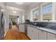 Galley kitchen with custom white cabinets, marble countertops, and stainless steel appliances at 239 Kings Hwy, Decatur, GA 30030