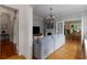 Inviting living room with hardwood floors, a cozy fireplace, and a beautiful chandelier at 239 Kings Hwy, Decatur, GA 30030