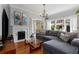 Cozy living room with hardwood floors, a fireplace, and comfortable seating with lots of natural light at 239 Kings Hwy, Decatur, GA 30030