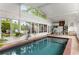 Indoor pool and adjacent outdoor patio create a perfect space for relaxation and entertainment at 239 Kings Hwy, Decatur, GA 30030
