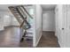 Bright and modern entryway with wood-look floors, a staircase, and neutral walls at 2820 Georgian Ter, Marietta, GA 30068