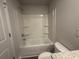 Clean, bright bathroom with a tub and shower combination at 35 Yellow Brick Way, Covington, GA 30014