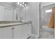 Bathroom with a vanity featuring granite countertop, and shower with marble-like tile at 1560 Sarah M Harden Dr, Atlanta, GA 30311