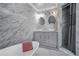 Elegant bathroom with double sinks, a stand-alone tub, shower and large-format tile at 1560 Sarah M Harden Dr, Atlanta, GA 30311