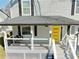 Inviting front porch with a porch swing and a modern railing design at 1560 Sarah M Harden Dr, Atlanta, GA 30311